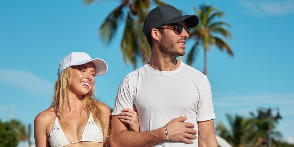 Models wearing Aquagaurd Hat on beach